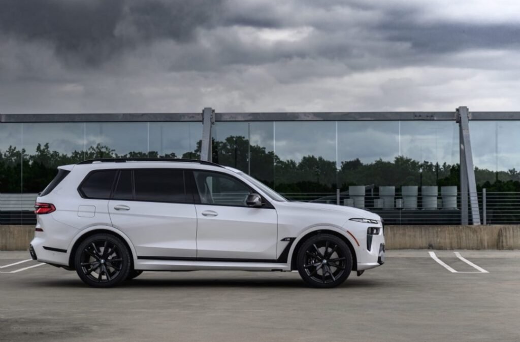 BMW SUV with factory privacy glass illustrating ceramic window tint choices
